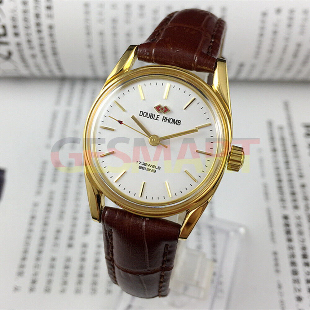 Beijing Double Rhomb mechanical watch featuring golden nail markers and polished gold case by Beijing brand.