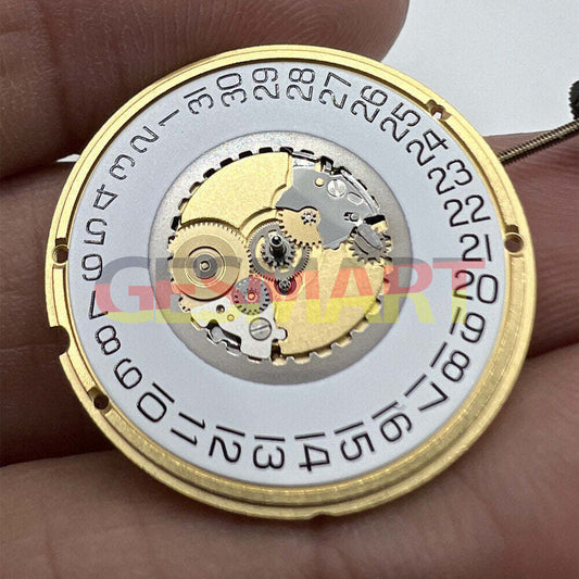 Montre <tc>ETA</tc> 955.112 à quartz, 3 aiguilles, date à 3 heures, mouvement suisse 