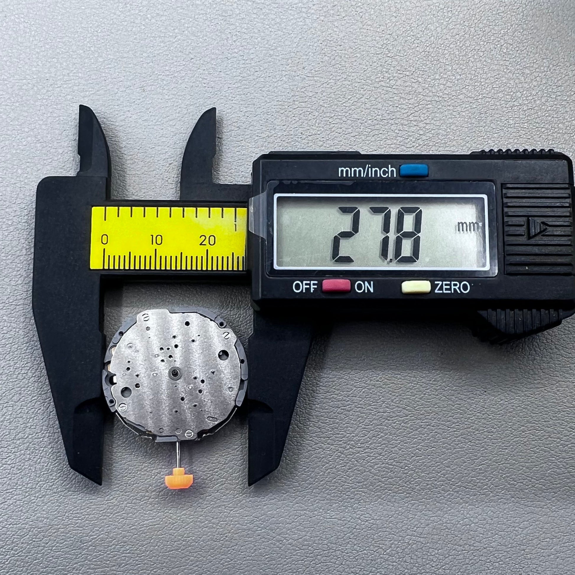 Japan Miyota JS10 quartz movement watch with small second hands at 6, 9, and 12 o'clock positions.