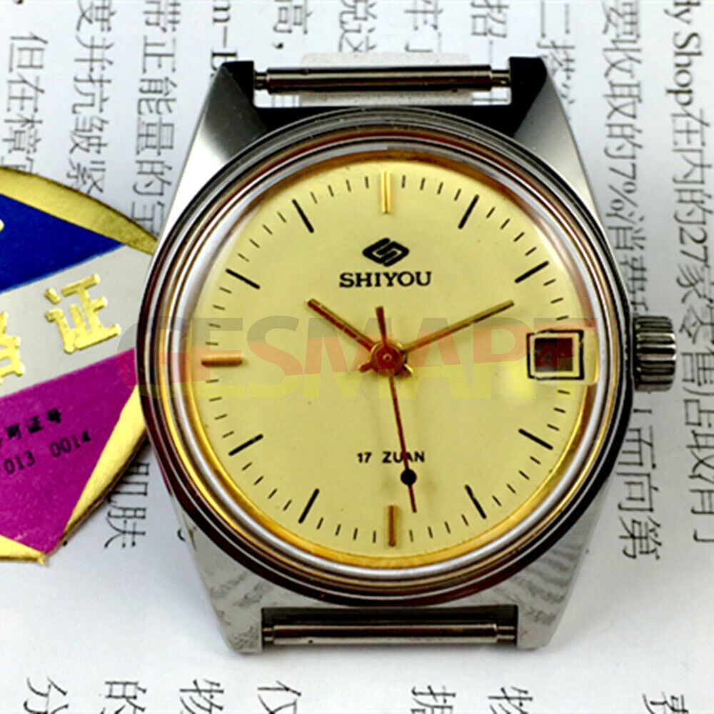 33mm Chinese manual mechanical watch with golden dial, single calendar, round case for elegant style.