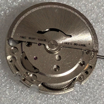 Japan Made Miyota 8205 mechanical watch part with double calendar feature for precise timekeeping.