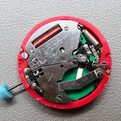 Swiss ISA 1198 watch movement with golden dial, date at 3 o'clock, weekday display, premium watch accessory.