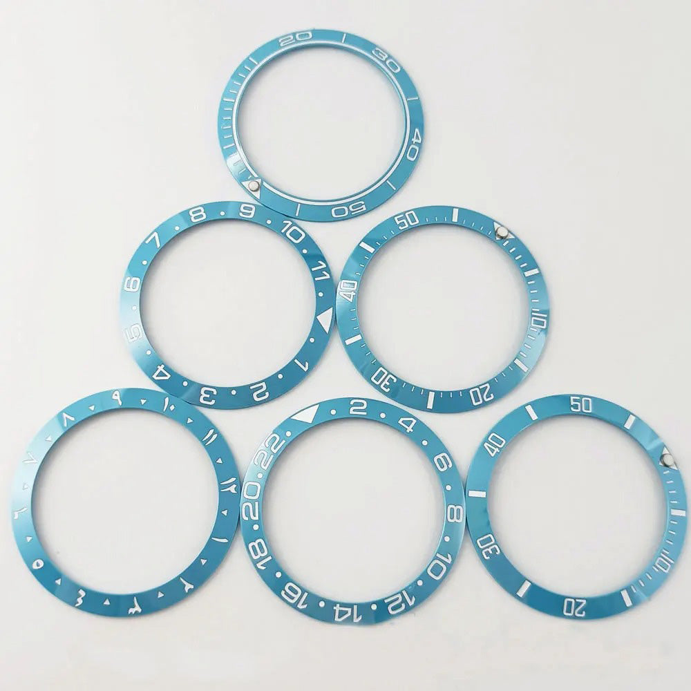 Blue ceramic bezel insert with white Arabic numerals for SUB GMT 38mm diver watch.