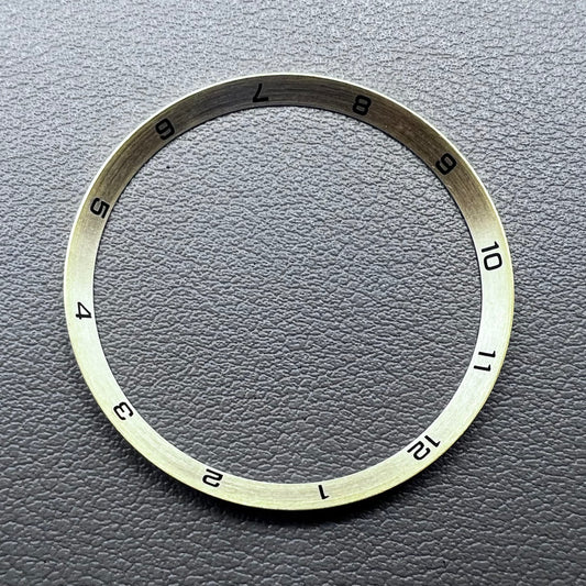 Golden stainless steel chapter ring for watches, 34.9x31.0x1.9mm, durable accessory.