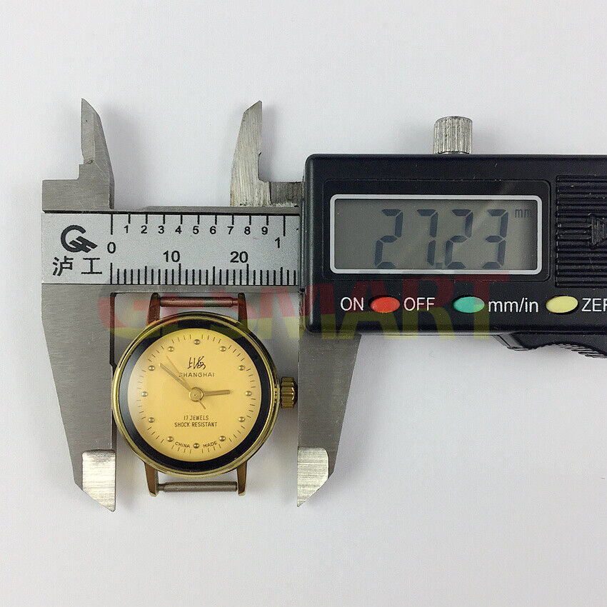 25mm China Made Lady manual mechanical watch with 17 jewels, yellow dial, and golden nail hands.