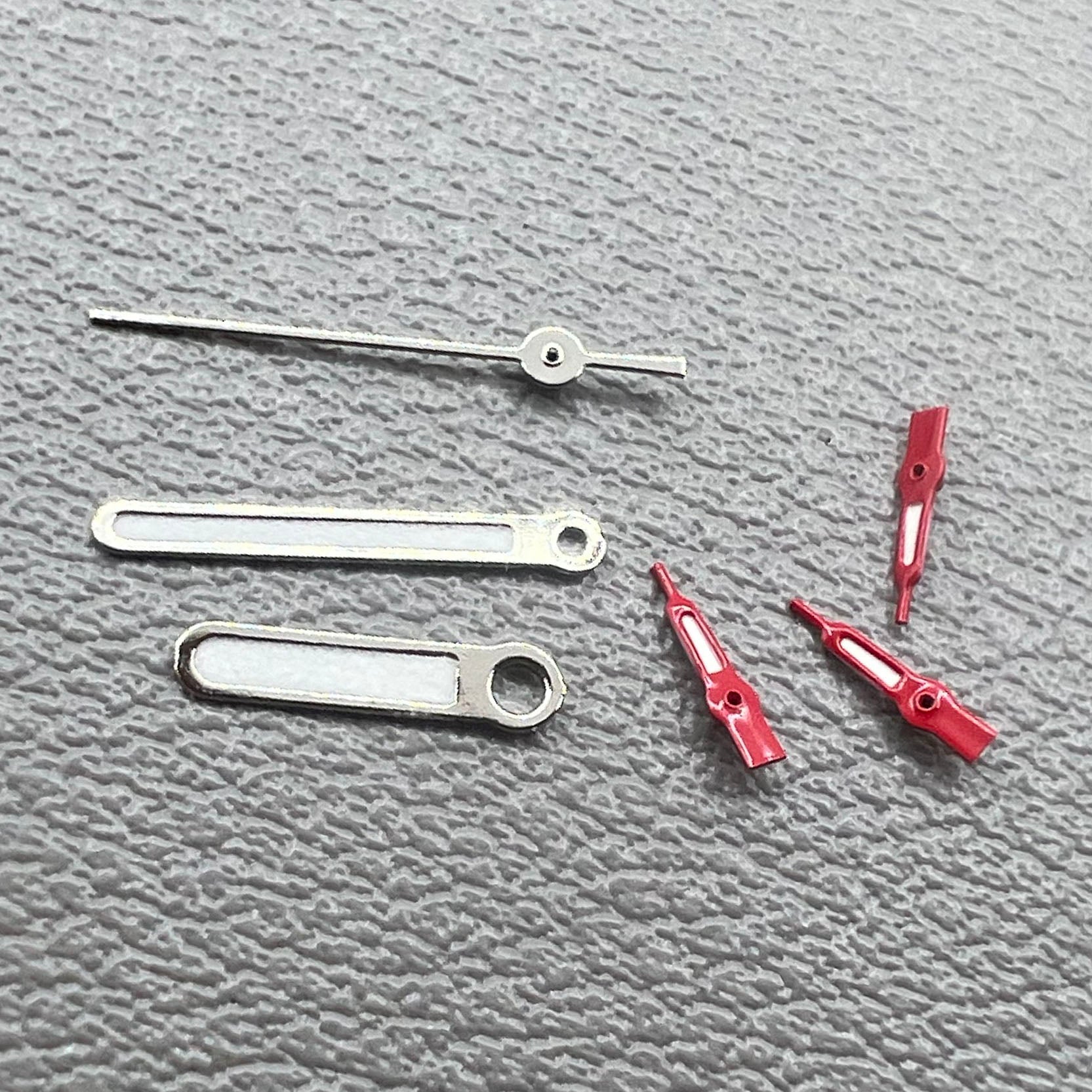 Set of red small second hands for VD53 VD54 VD57 watch movements, ideal for precise timekeeping.