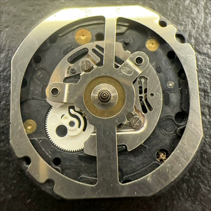 Japan-made VX37 quartz watch part, 3-hand movement for precise timekeeping and repair.