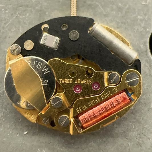 Swiss Made ETA980.003 quartz movement black circuit board for precision watch repair.