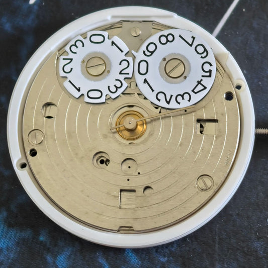 FE 7531 quartz movement watch repair part with three hands for accurate timekeeping.