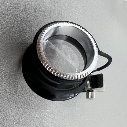 Swiss Bergeon 7913 eyeglass with clip-on magnifier, ideal for detailed watch repairs and accessories.