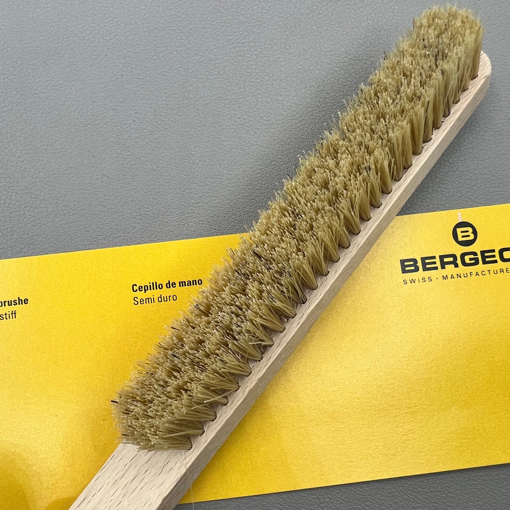 Swiss Bergeon 6377-2 hand brush with hard bristles for precise watch accessory cleaning.