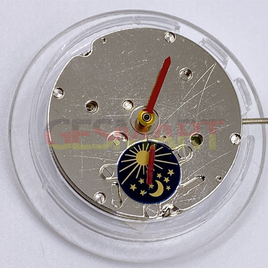China Made 2813 automatic mechanical watch movement showing 3 hands and moon star phase at 6 o'clock.