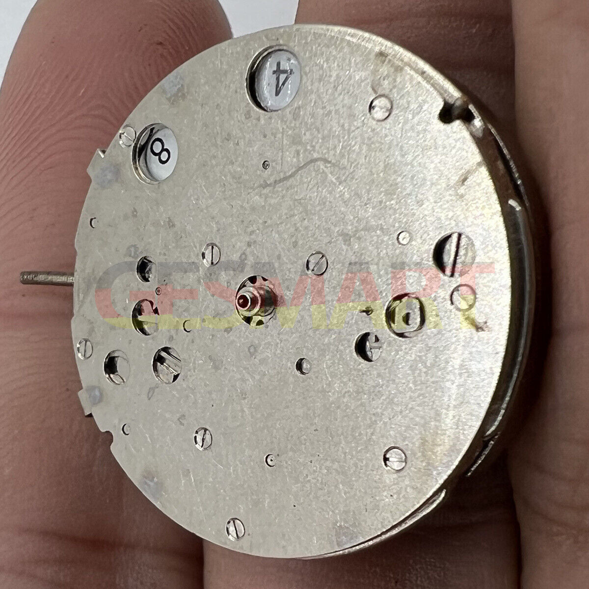Disassembled automatic mechanical watch movement by China Made, perfect for watch repair enthusiasts.