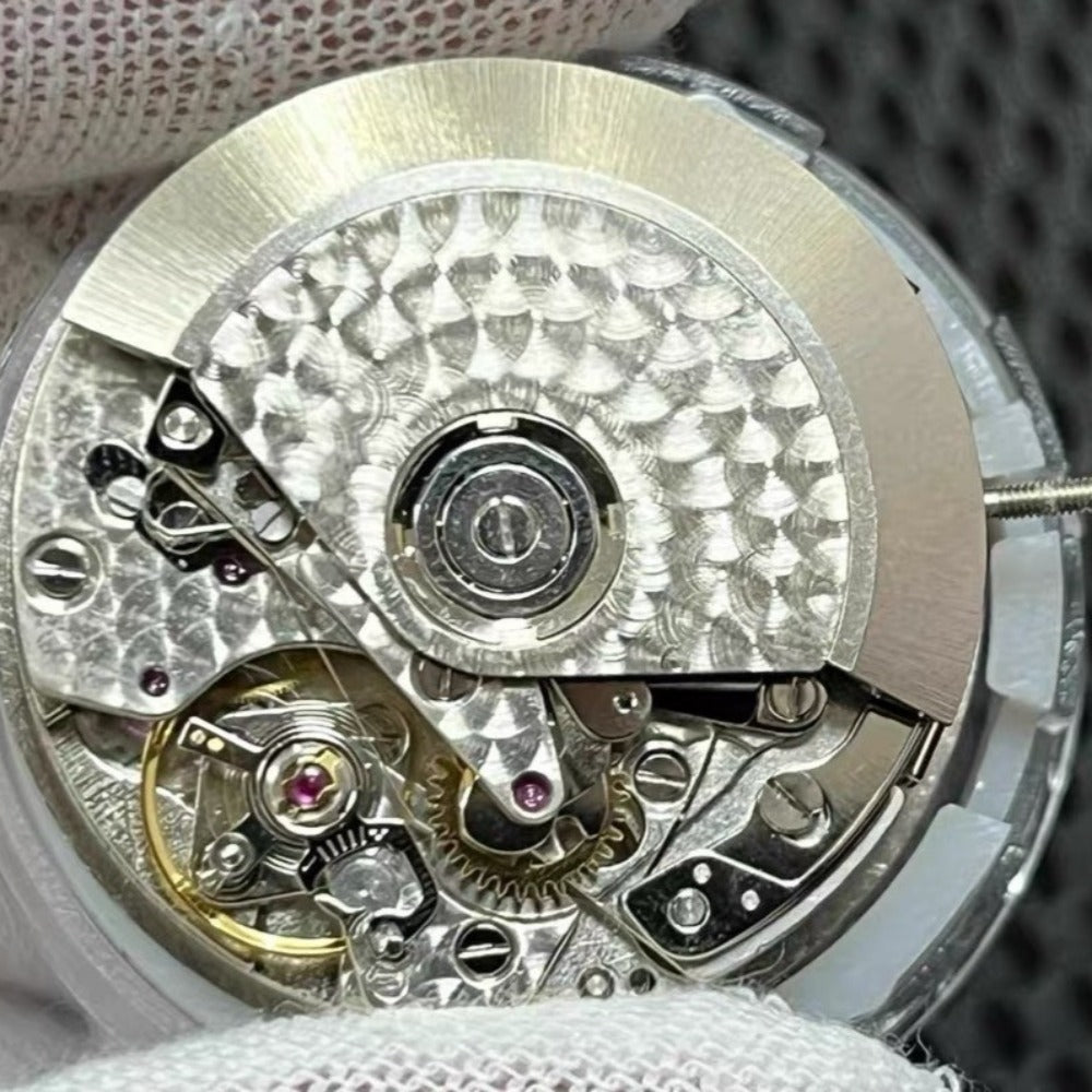 Dandong 7751 automatic watch movement with 8 hands for precise multifunctional timekeeping.