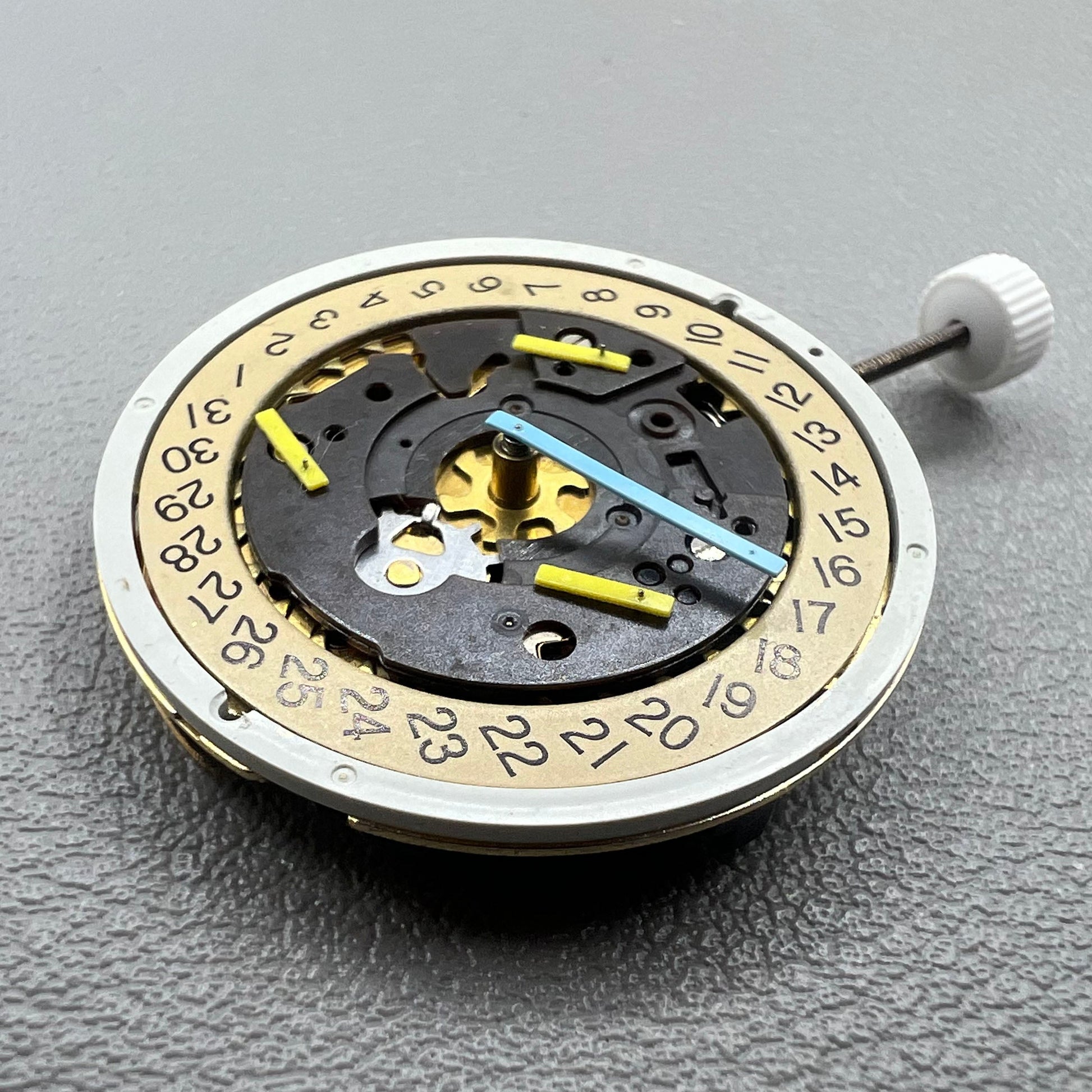 Swiss ISA 8162 golden watch disk with date feature, quartz movement replacement by ISA, ideal for watch repair.