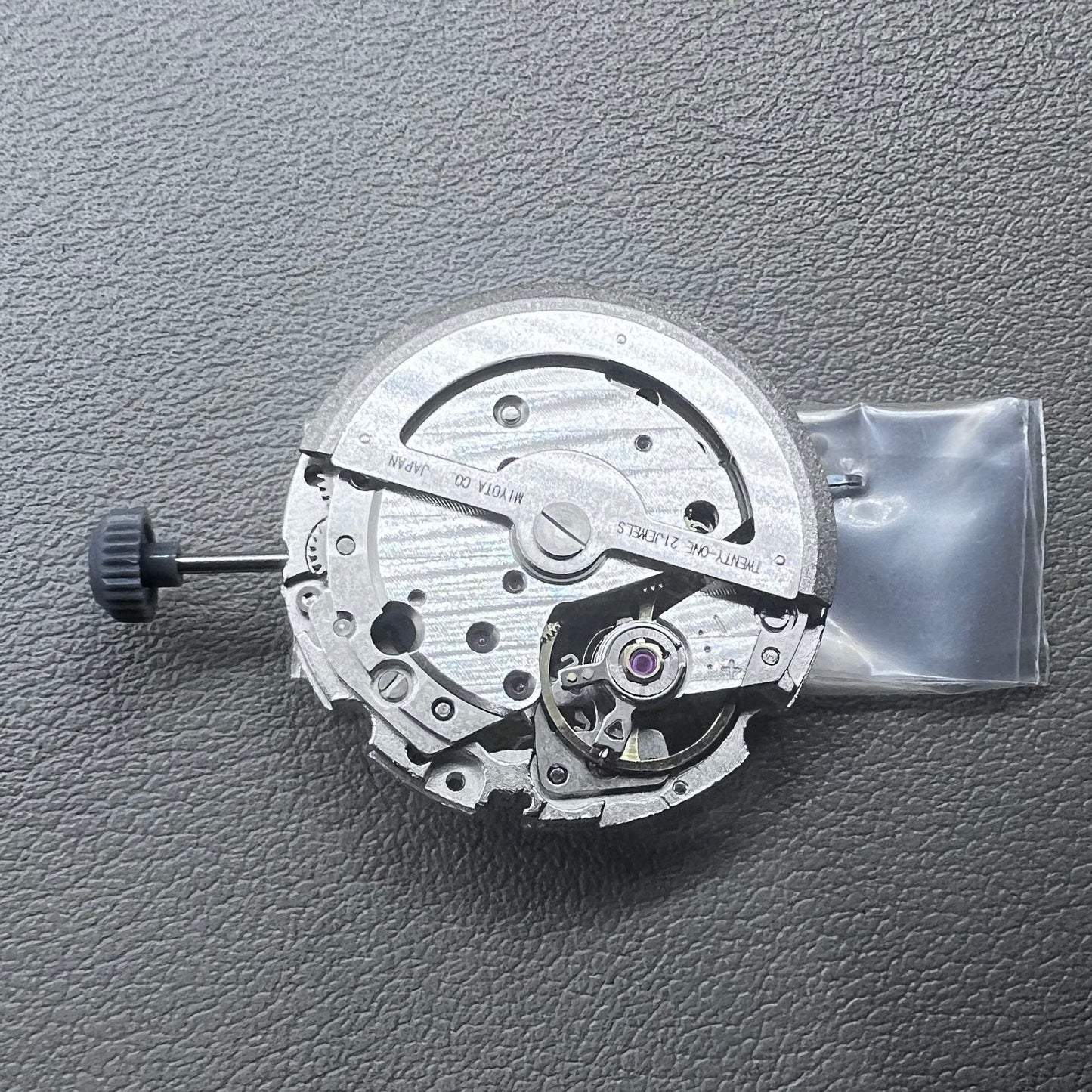 Japan Miyota 82S0 silver hollow automatic mechanical watch movement with visible gear design for precision timekeeping