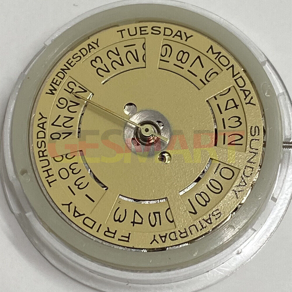 Asian Tianjin Seagull T16 watch with day-date function, automatic mechanical movement, and golden dial design.