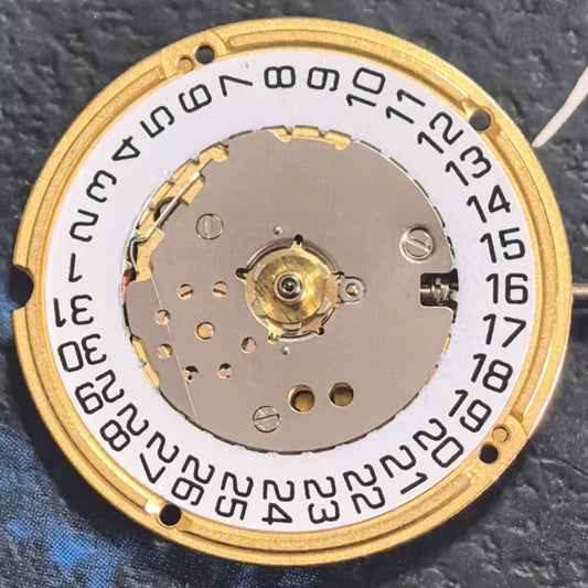 Swiss Made ETA F04.115 quartz watch movement with three hands and date display at 3 o?clock