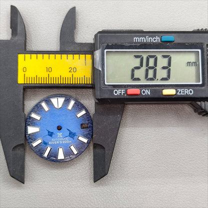 watch dial with S logo