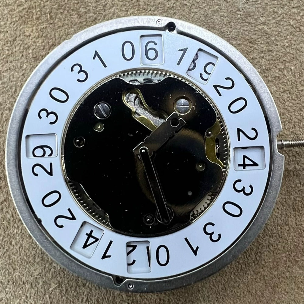 Swiss Part 5040.B Quartz movement watch component with date display at 12, ideal for precise repairs.