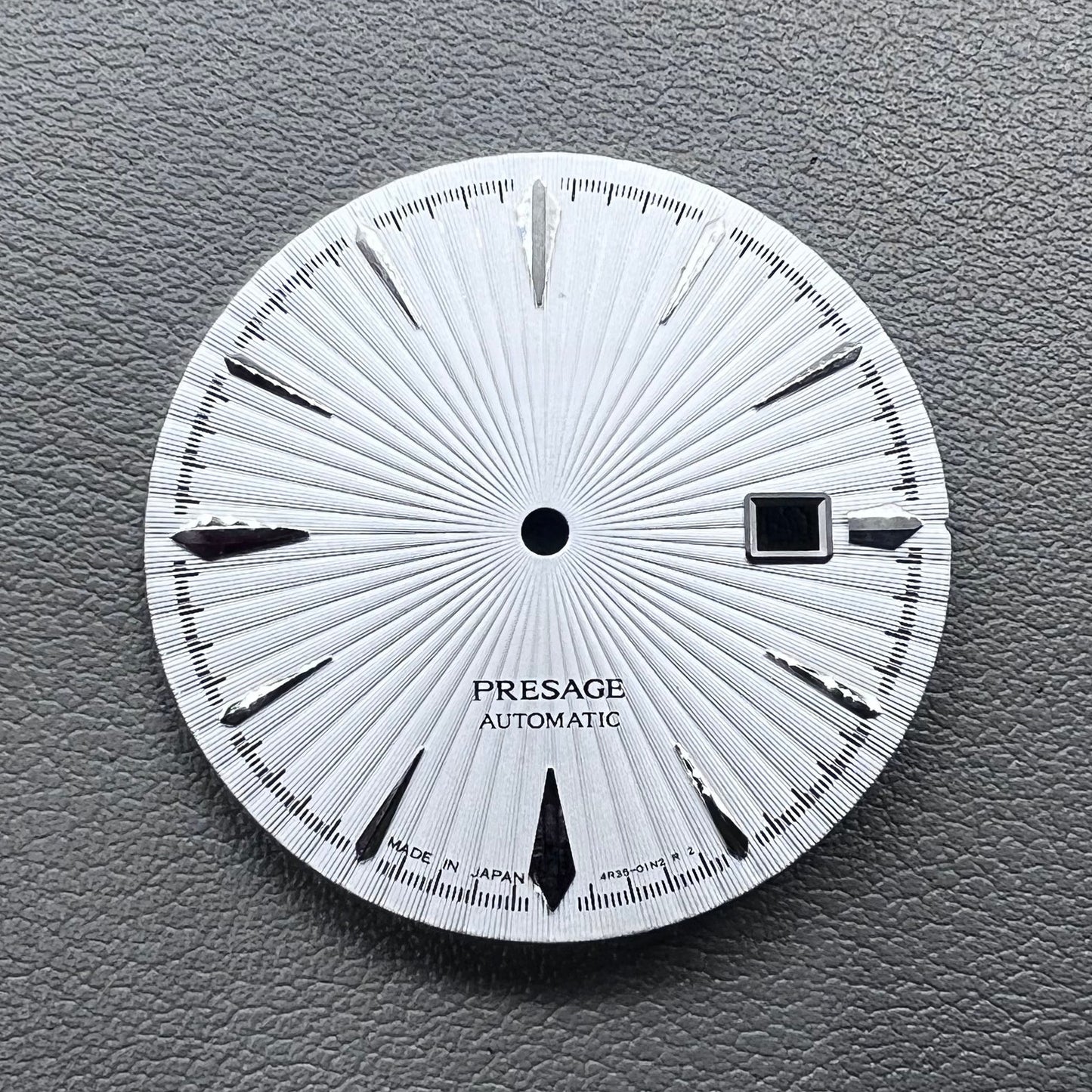 35mm silver watch dial with white cocktail markers, no lume, compatible with NH35 movement by Nail+White.