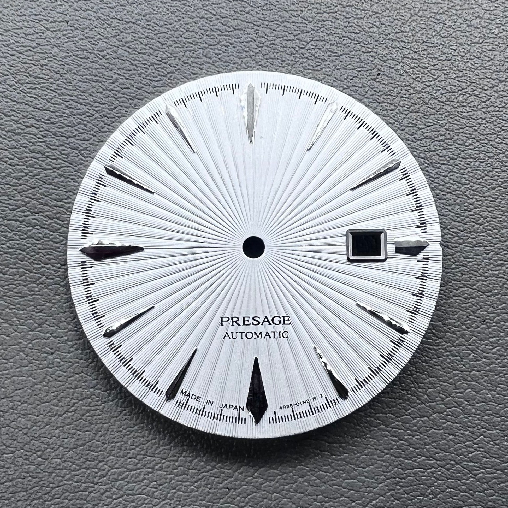 35mm silver watch dial with white cocktail markers, no lume, compatible with NH35 movement by Nail+White.