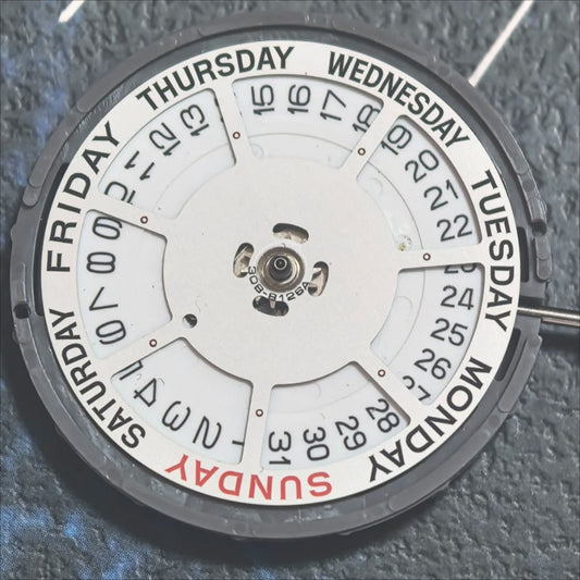 Japan Made Miyota 6M55 quartz movement watch part with 3 hands and date display at 3 o'clock.