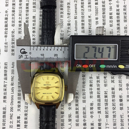 27mm golden square case ladies watch by Tianjin Seagull featuring mechanical movement and elegant style.