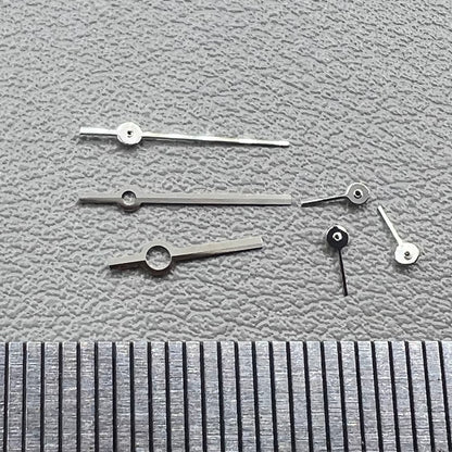 Silver watch hands set compatible with Ronda 5030.D quartz movement, precision timepiece parts.