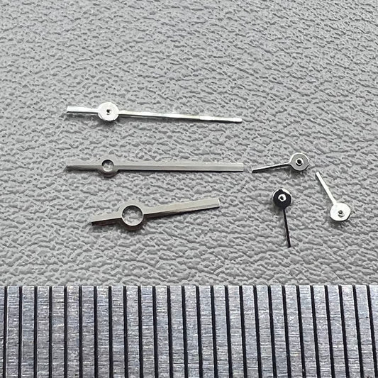 Silver watch hands set compatible with Ronda 5030.D quartz movement, precision timepiece parts.