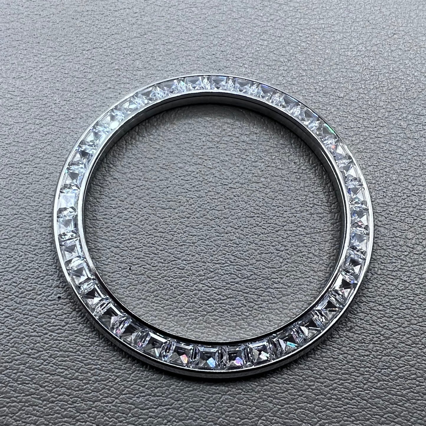 Silver 39.4mm Daytona watch bezel with T-shaped square diamond moissanite, flat bottom design.
