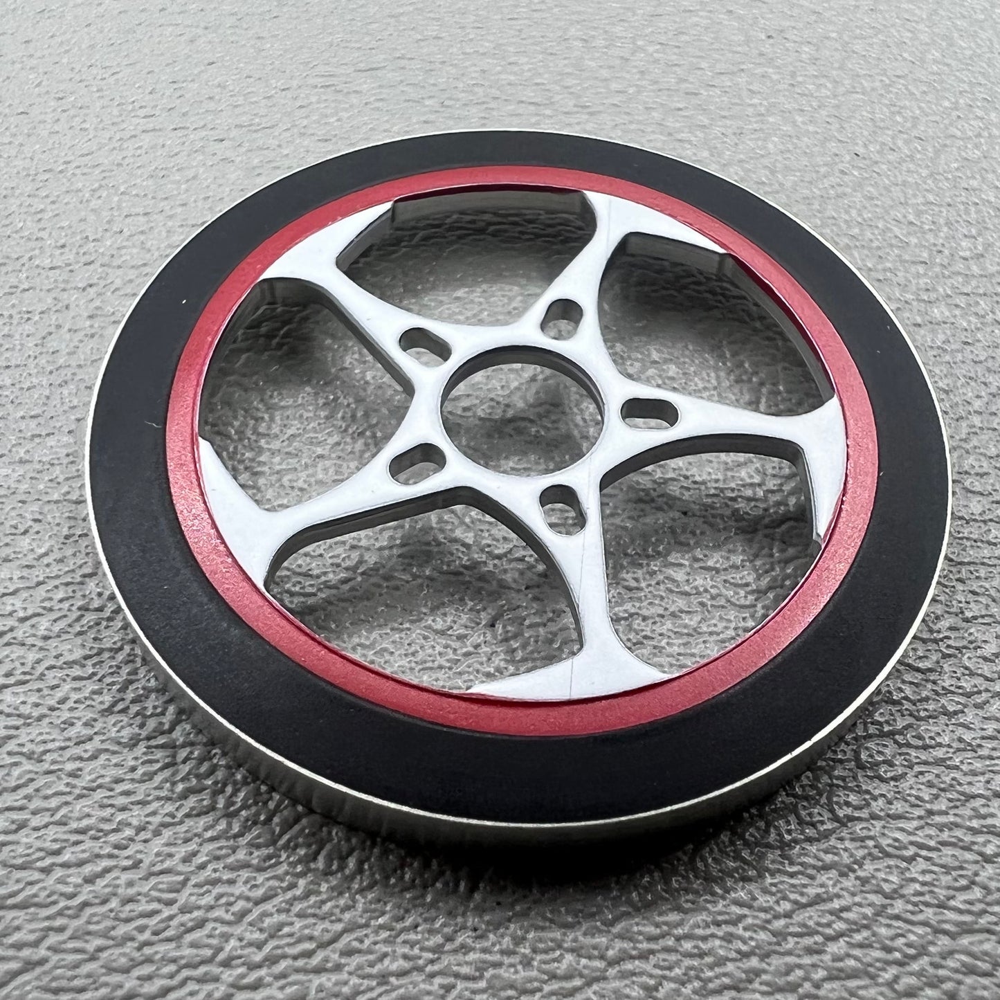 Red and white rotor oscillating weight for NH34-NH39 watch movements, enhancing automatic winding efficiency.