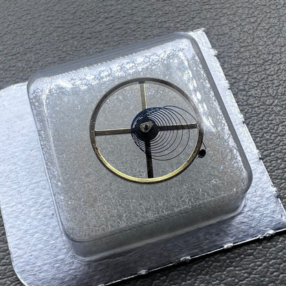 Complete balance wheel with blue hairspring for China Made 3135 3186 movement, precision watch accessory.