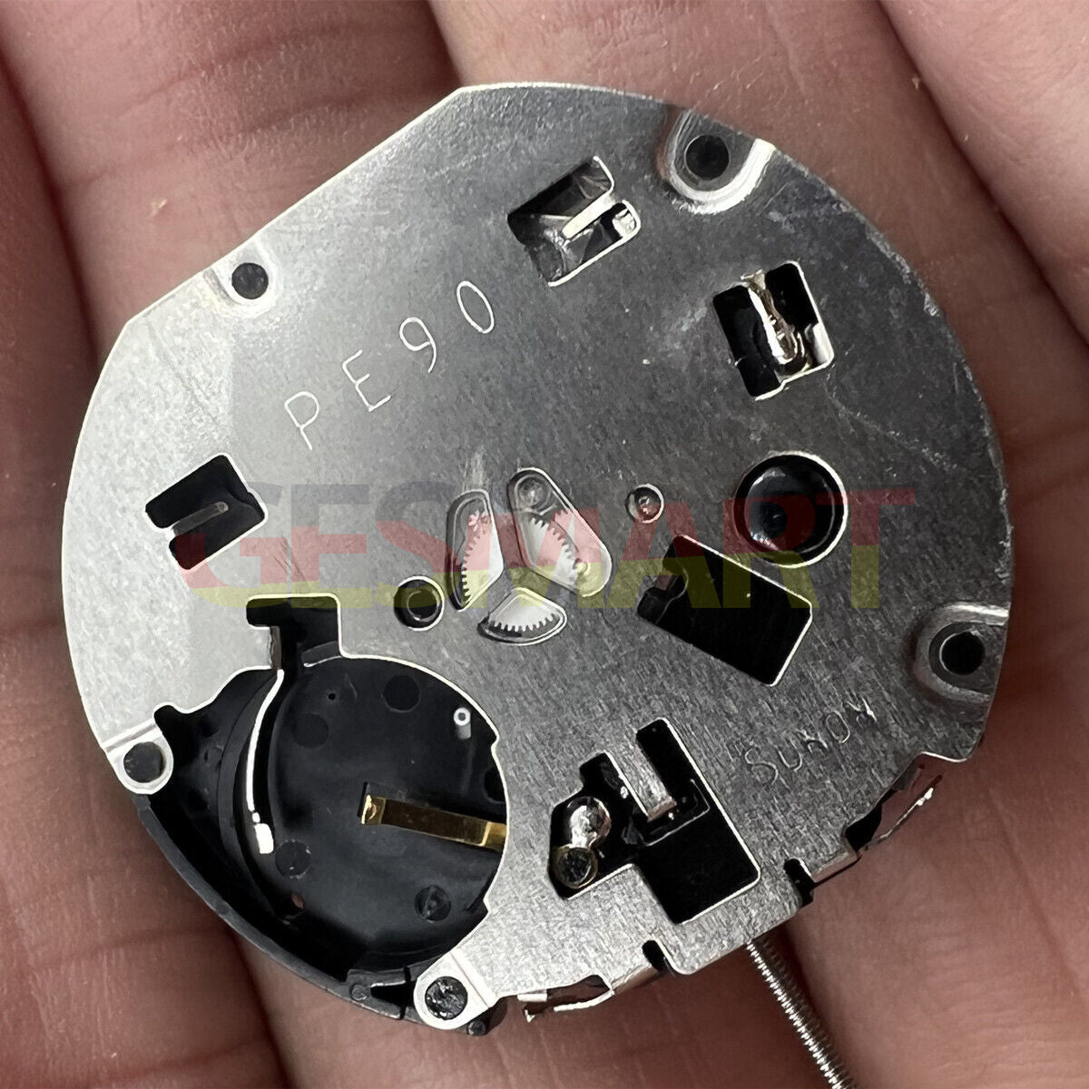 Sunon PE90 quartz watch movement with 3 hands, date at 3, small seconds at 3, 6, and 9 o'clock positions.