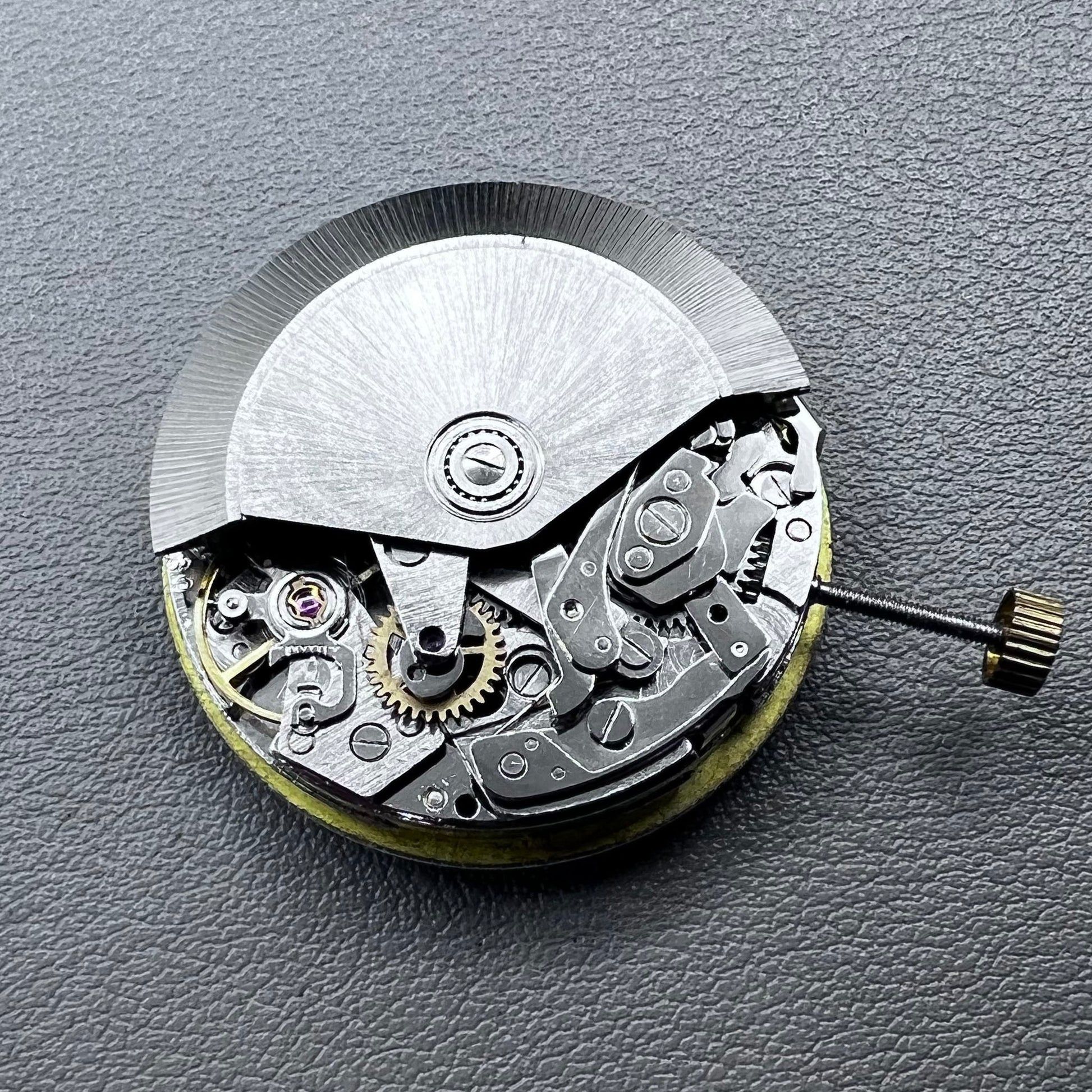 Shanghai 7750 mechanical watch movement with single calendar and small second at 9 o'clock, precision timekeeping.
