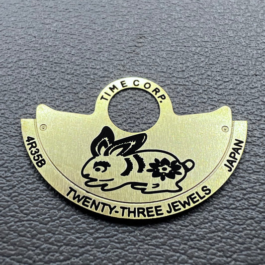 Golden Rabbit rotor overlay for NH35/NH36 4R35 movement, enhancing watch accessory aesthetics and brand style.