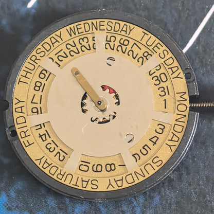 Swiss ETA805.144 quartz movement with golden disk, 3-hand watch part for precise timekeeping.