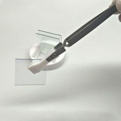 Wide headed PTFE tweezers, acid and alkali resistant, reverse self-locking for secure handling.