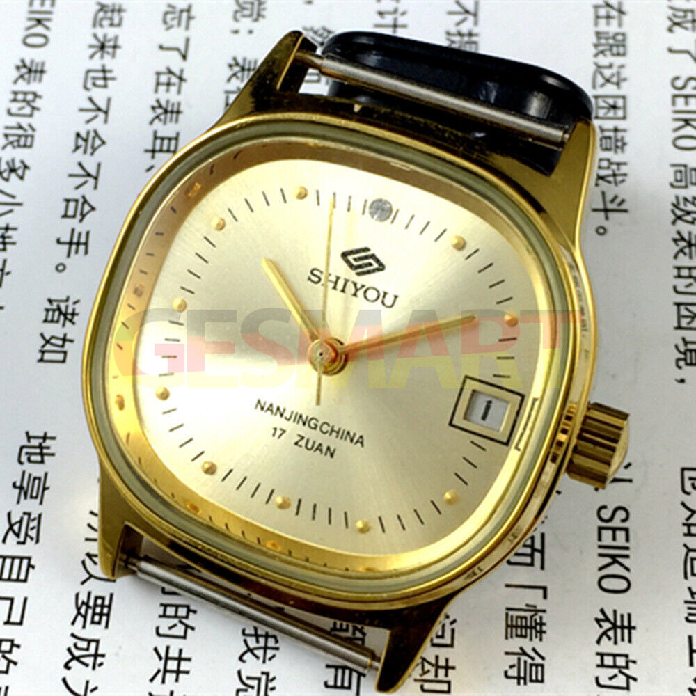 Golden 35mm manual mechanical watch with single calendar, crafted in China, featuring elegant golden dial and case.