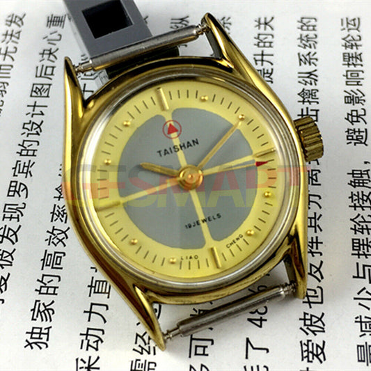 TAISHAN mechanical lady watch with 19 jewels, yellow-grey dial, and round golden case for elegant style.