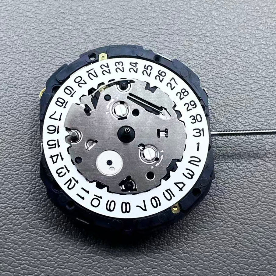 Japan YM57.A watch accessory featuring quartz multifunction movement with small second subdials at 6, 9, and 12 o'clock.