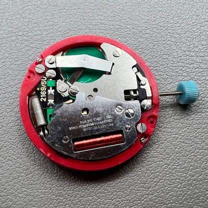 Swiss ISA 1198 watch movement with golden dial, date at 3 o'clock, weekday display, premium watch accessory.