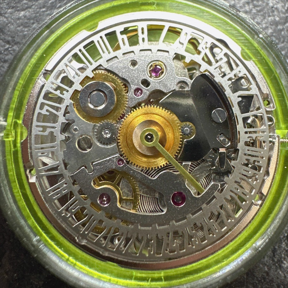 Hollow silver China Made Dandong watch with 2824-2 mechanical movement and date at 6 display.
