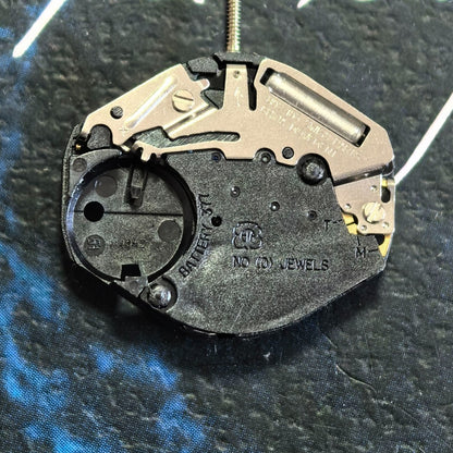 Swiss ETA802.105 quartz watch part showing 3-hand movement without calendar, ideal for precise repairs.