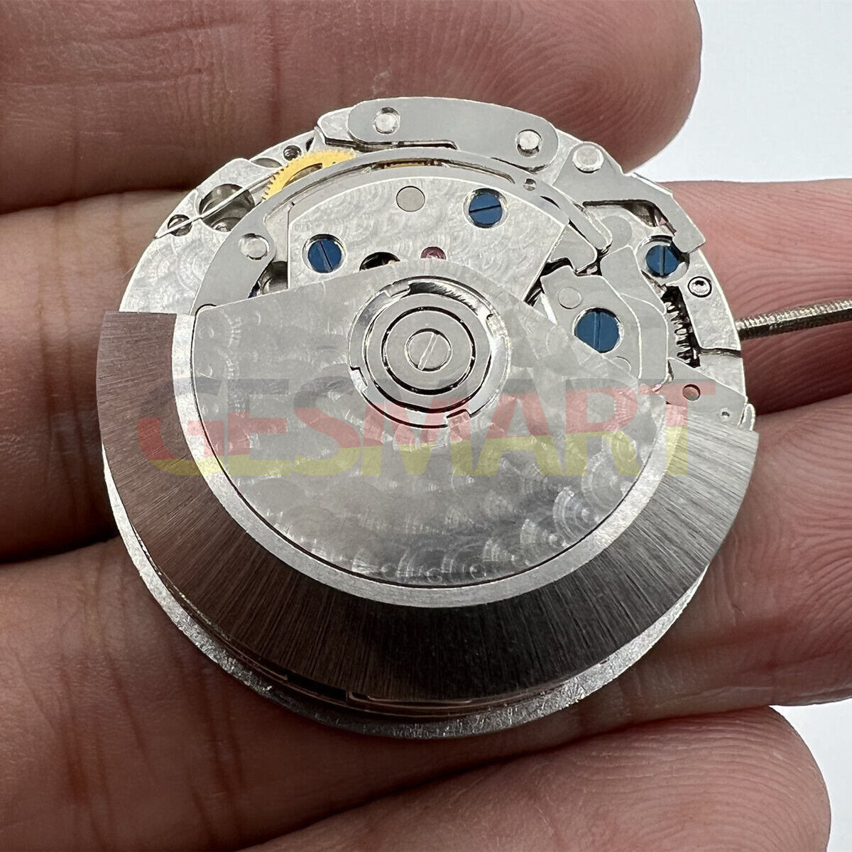 Black Dandong 7753 automatic watch movement with small second at 9, precision mechanical by China Made.