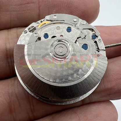 Black Dandong 7753 automatic watch movement with small second at 9, precision mechanical by China Made.