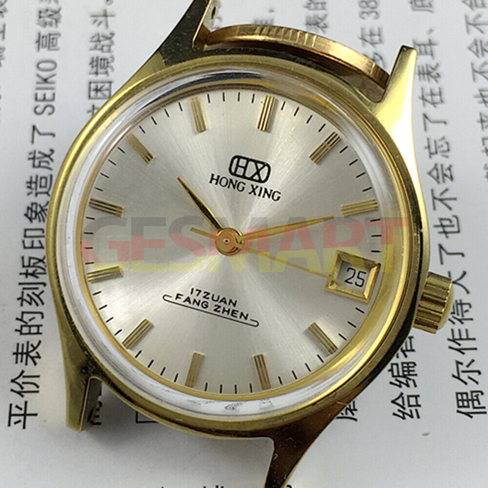 32mm China Made manual mechanical watch with single calendar, 17 jewels, round silver case design.