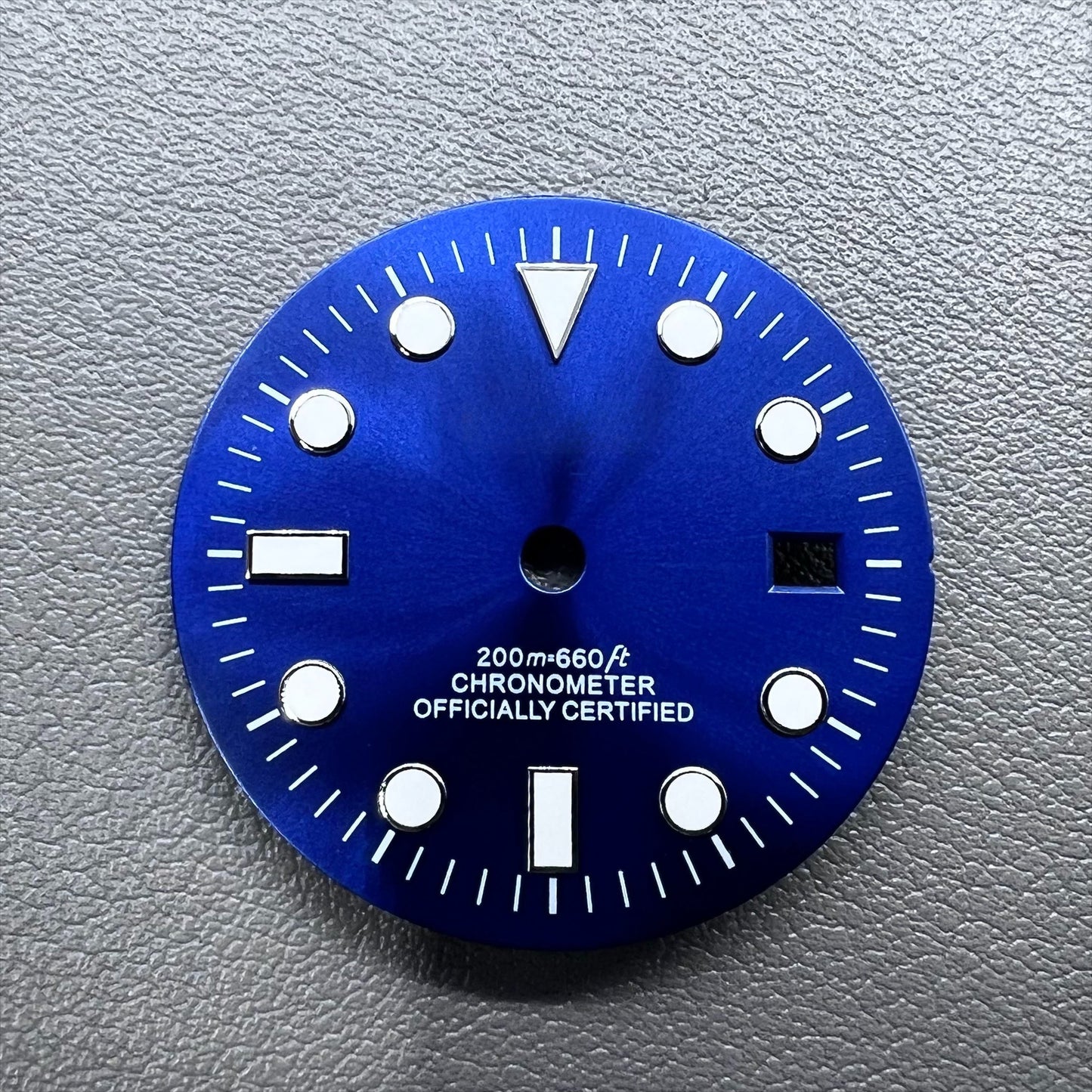 Blue 32mm GMT diving watch dial with green luminous markers for NH34 movement.
