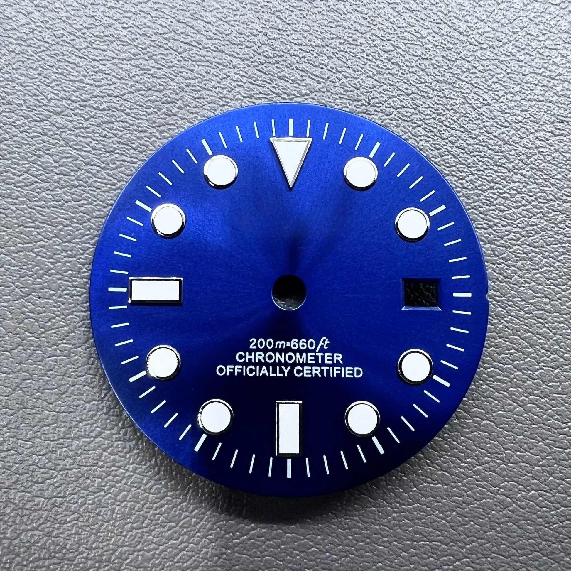 Blue 32mm GMT diving watch dial with green luminous markers for NH34 movement.