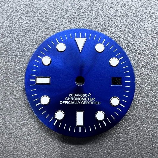 Blue 32mm GMT diving watch dial with green luminous markers for NH34 movement.